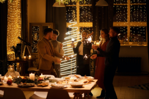 A family enjoying a cozy Christmas party at home