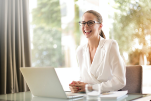  A businesswoman working in an office with a laptop